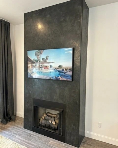 Visual Harmony Studios - Black Venetian Plaster fireplace